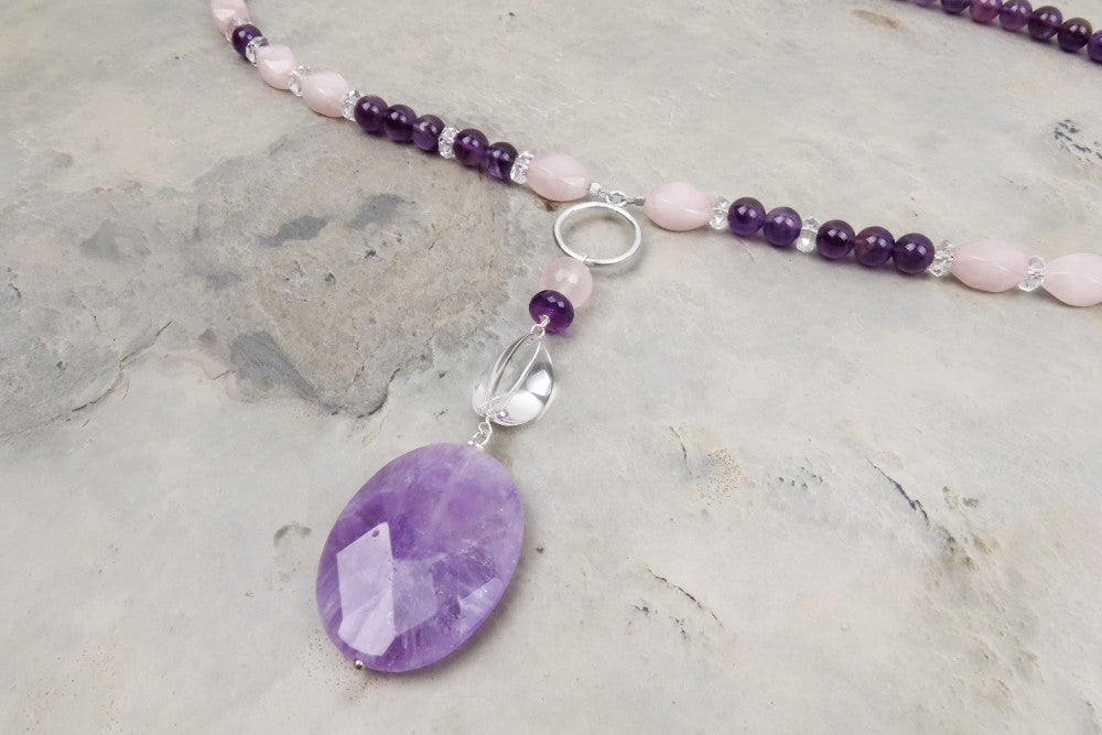 Long gemstone necklace amethyst rock crystal rose quartz striking harmonious elegant accents modern design