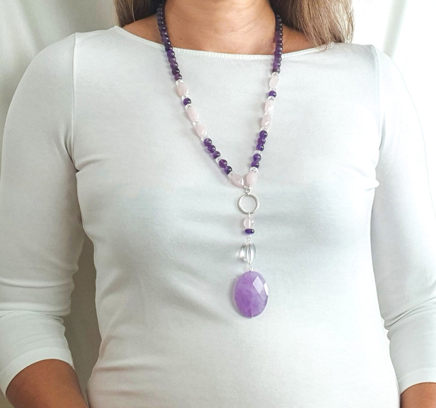 Long gemstone necklace amethyst rock crystal rose quartz striking harmonious elegant accents modern design