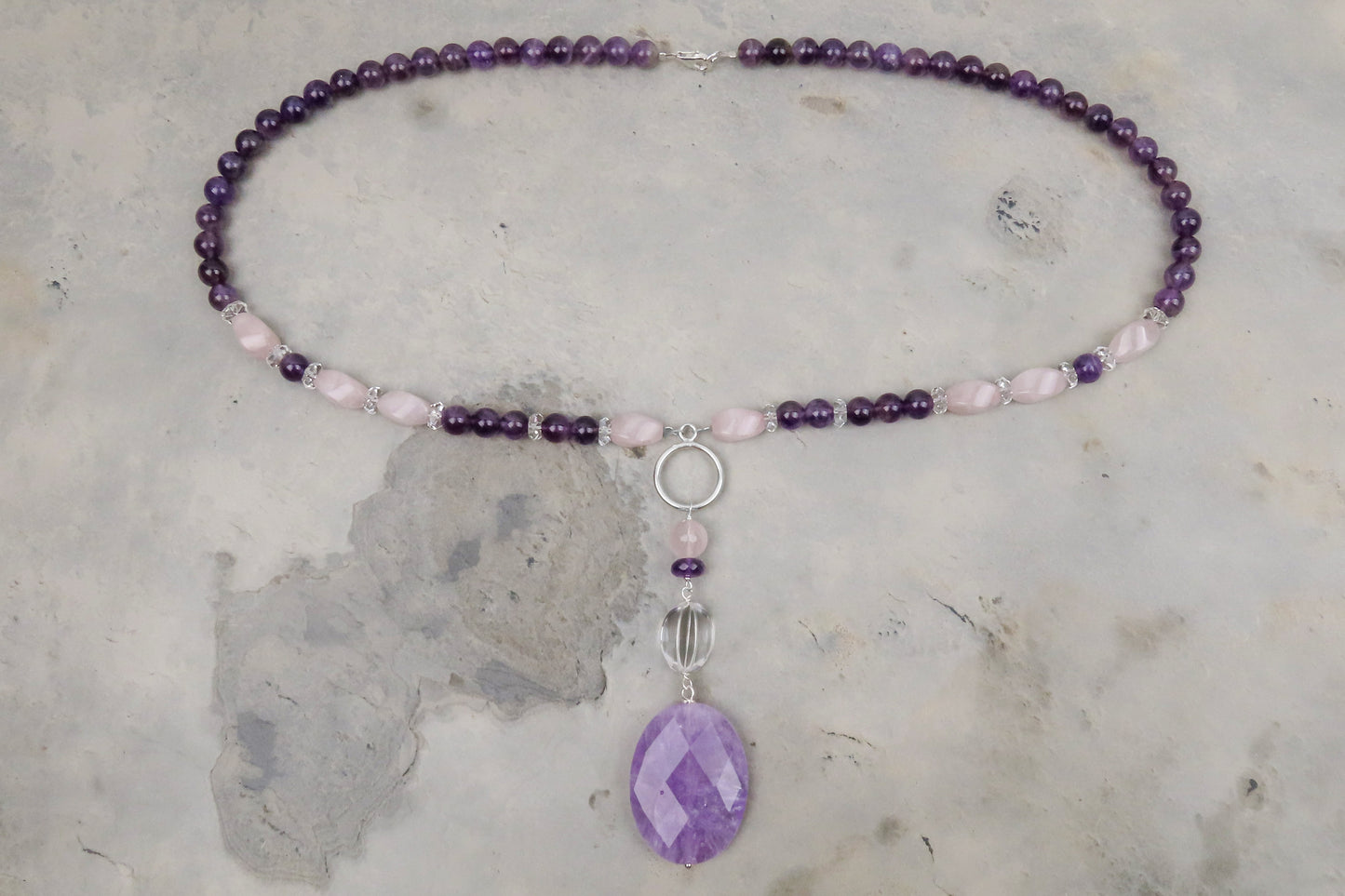 Long gemstone necklace amethyst rock crystal rose quartz striking harmonious elegant accents modern design