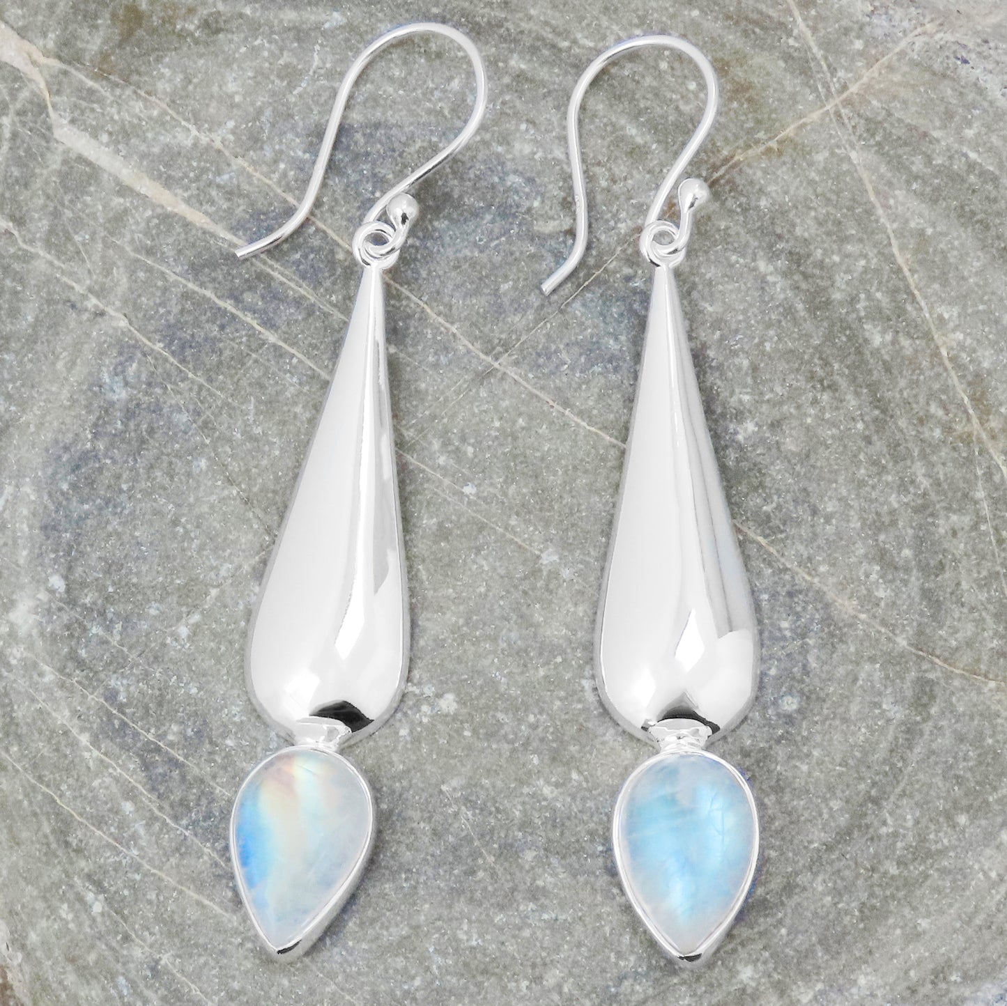 Long silver earrings rainbow moonstone gemstone iridescent stylish elegant design subtle individuality