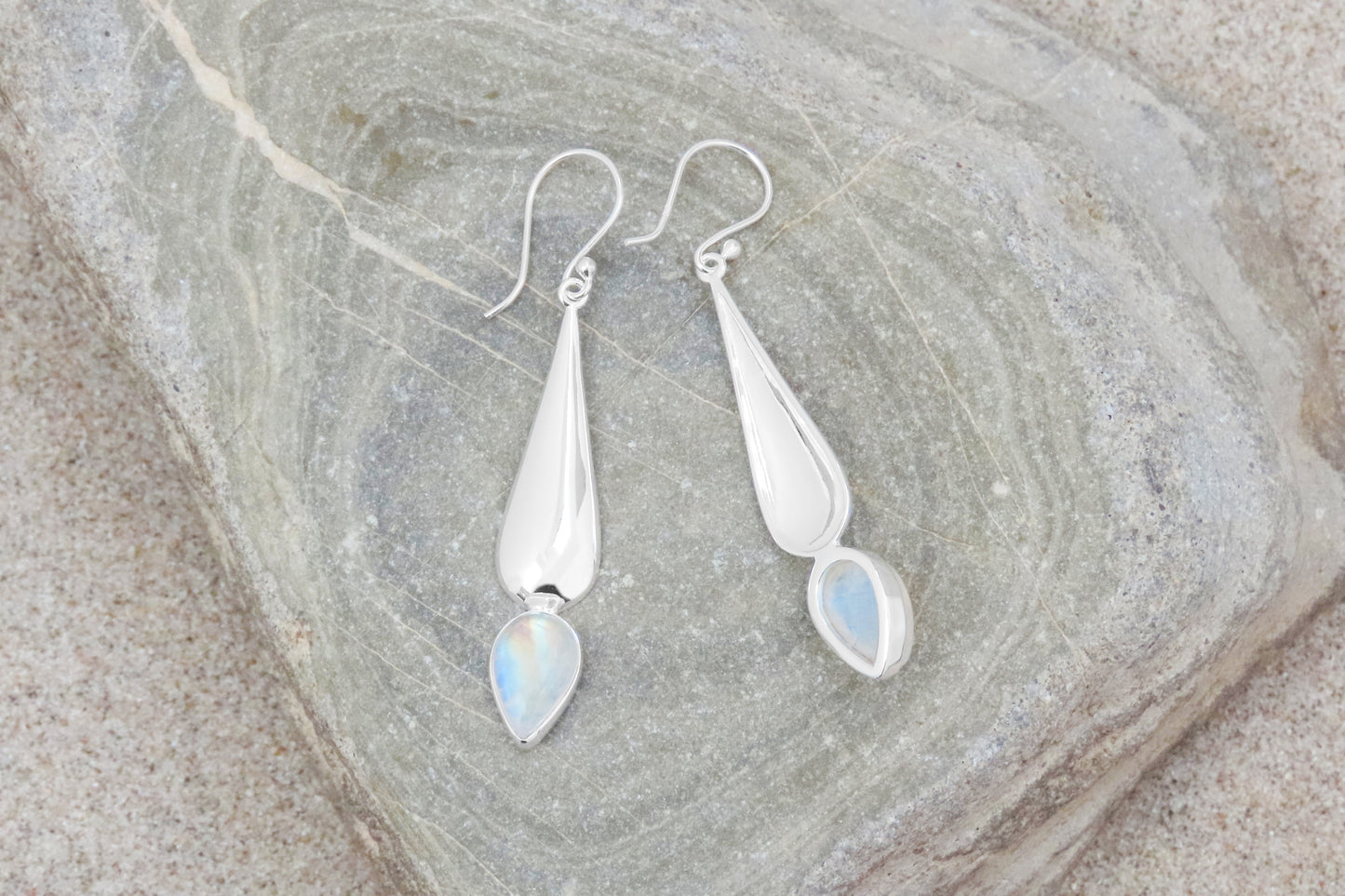 Long silver earrings rainbow moonstone gemstone iridescent stylish elegant design subtle individuality