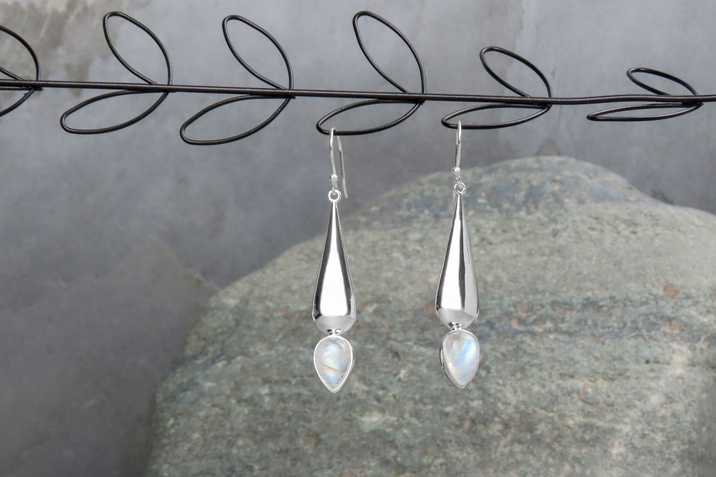 Long silver earrings rainbow moonstone gemstone iridescent stylish elegant design subtle individuality